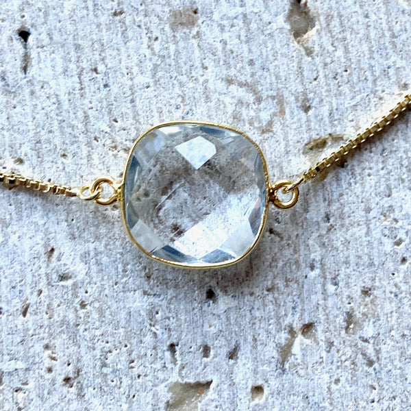 Crystal quartz with gold slider bracelet salon
